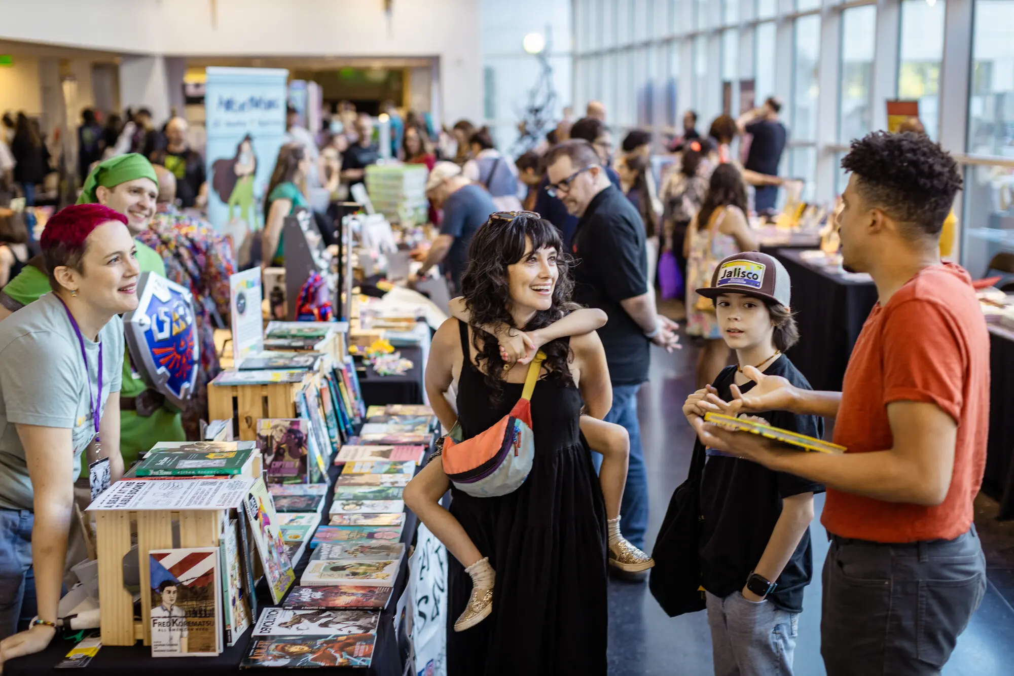 Families walk through CrockerCon.