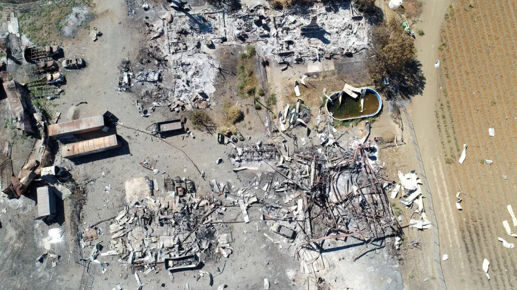 The remains on Sept. 23 of the fireworks storage facility explosion that occurred on July 1, 2025, in Esparto, California. Photo by Denis Akbari.