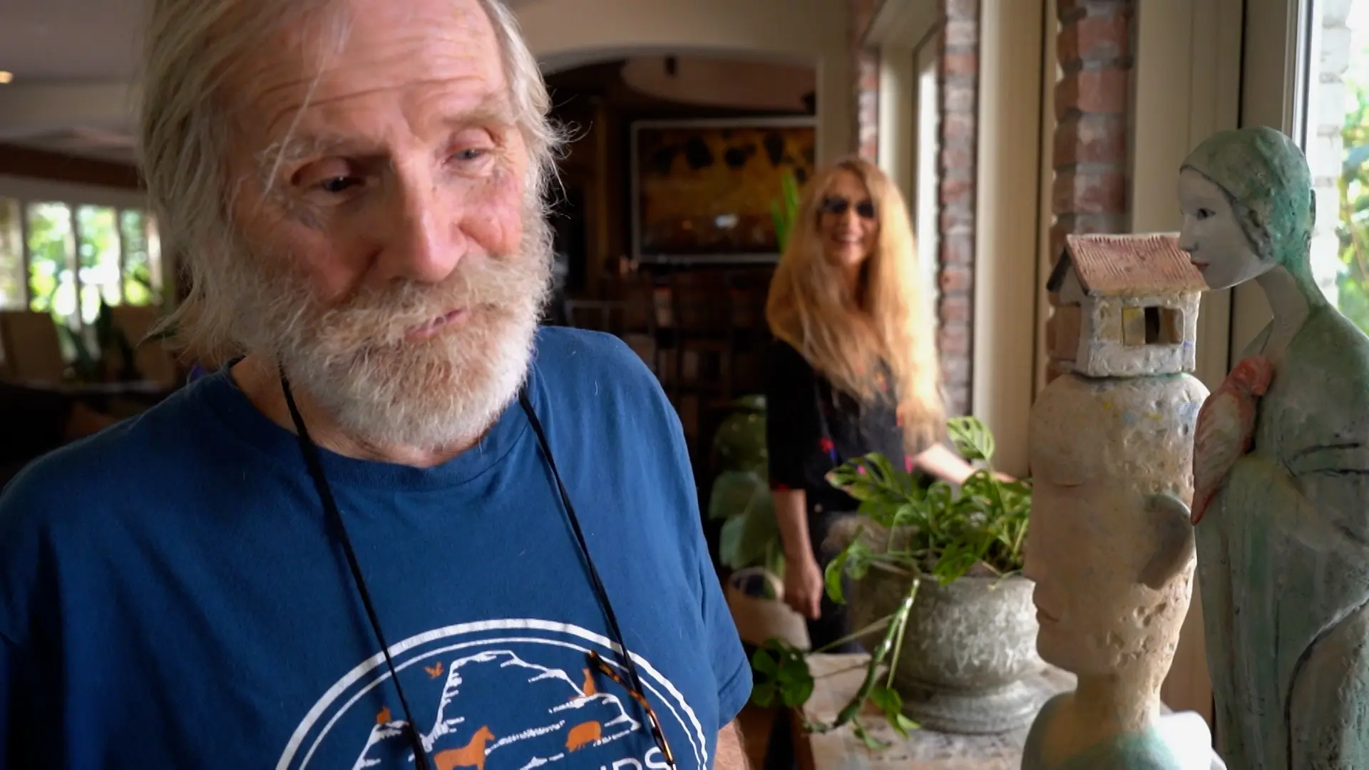 man and daughter in house