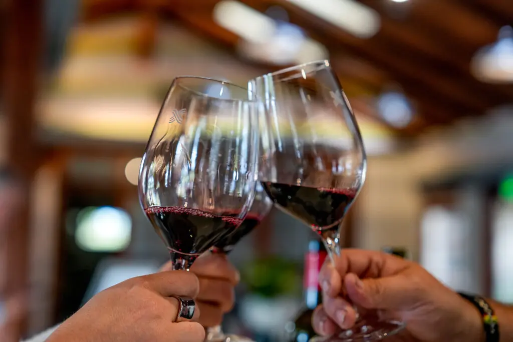 Wine glasses clinking