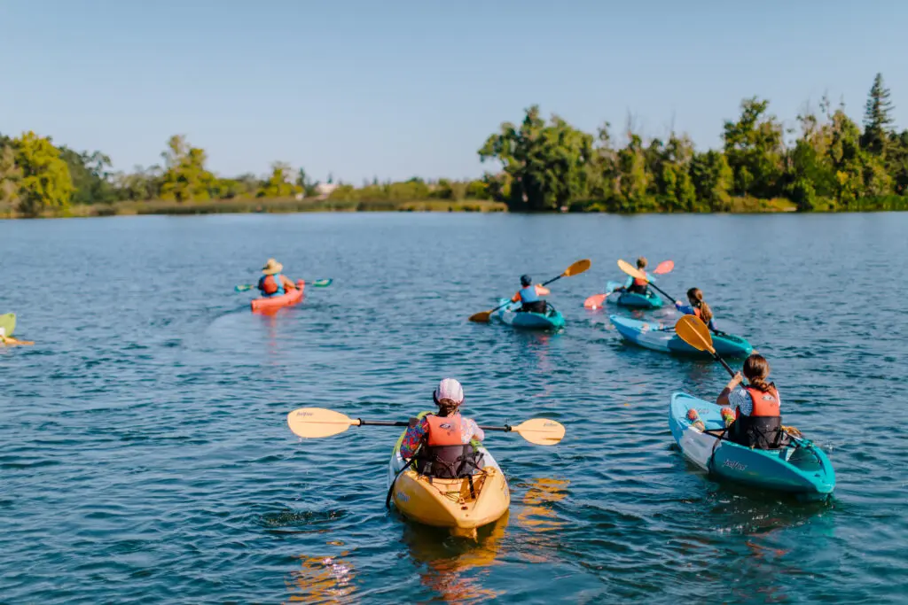 kayakers on a lake