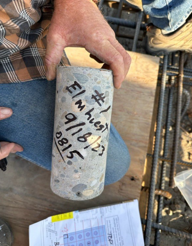 man holds a core sample