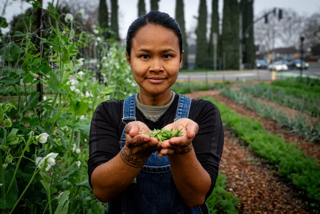 Woman holding crop