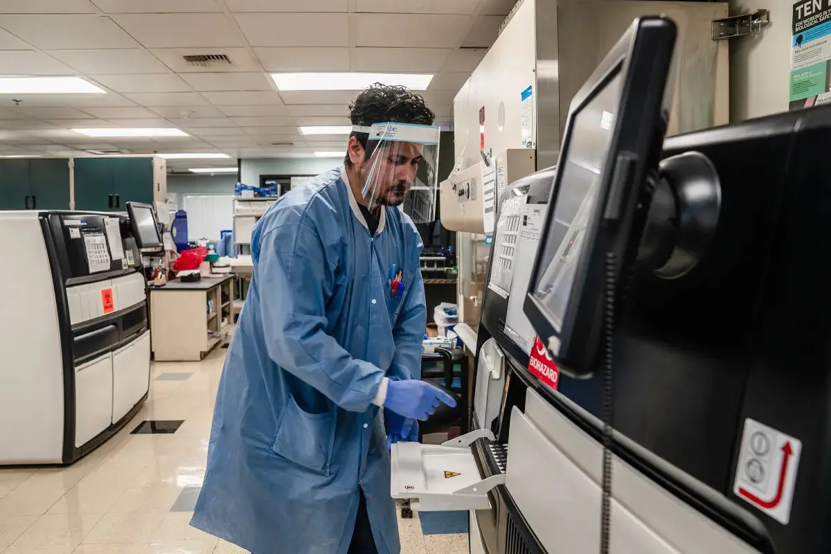 Lab Assistant Abraham Jimenez loads blood samples for automated serology testing for measles immunity status at the Los Angeles County Department of Public Health laboratory in Downey on Feb. 26, 2026.