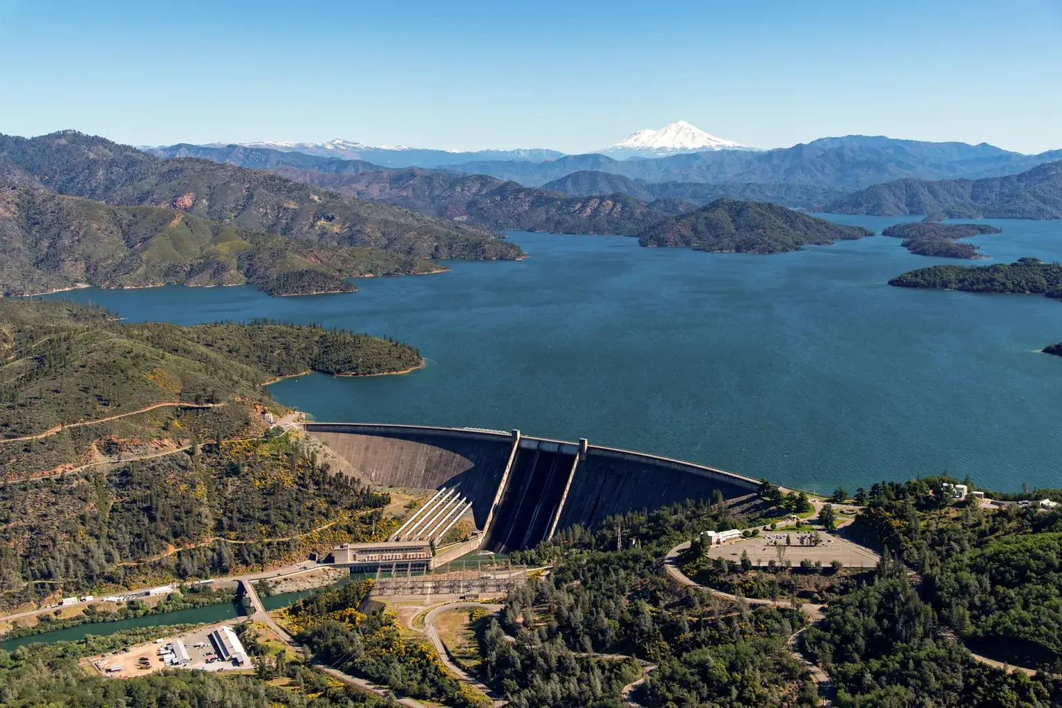 An aerial view of Lake Shasta and the dam in Shasta County, on May 9, 2024. On this date, the reservoir storage was 4,380,600 acre-feet (AF), 96 percent of the total capacity.