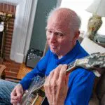 person playing banjo