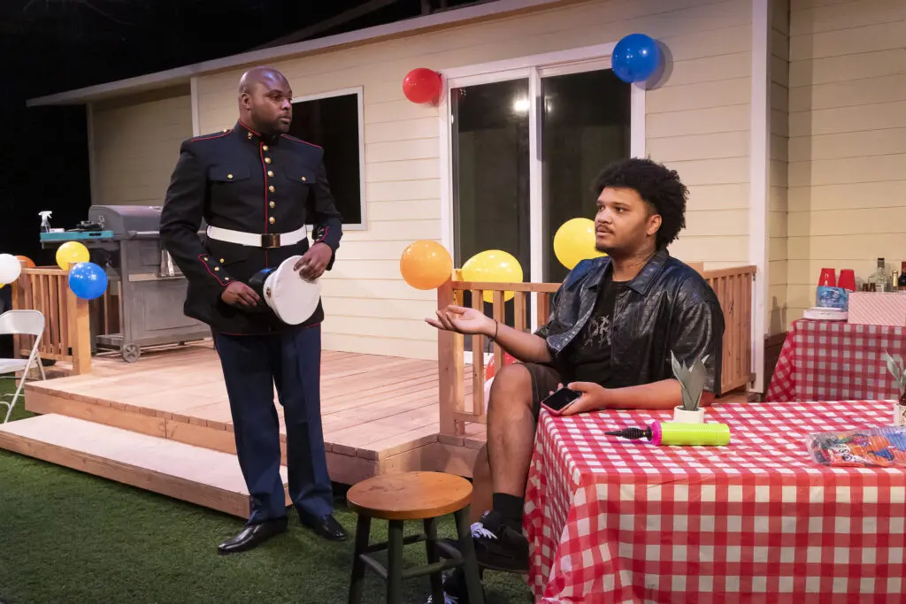 Two men act on stage