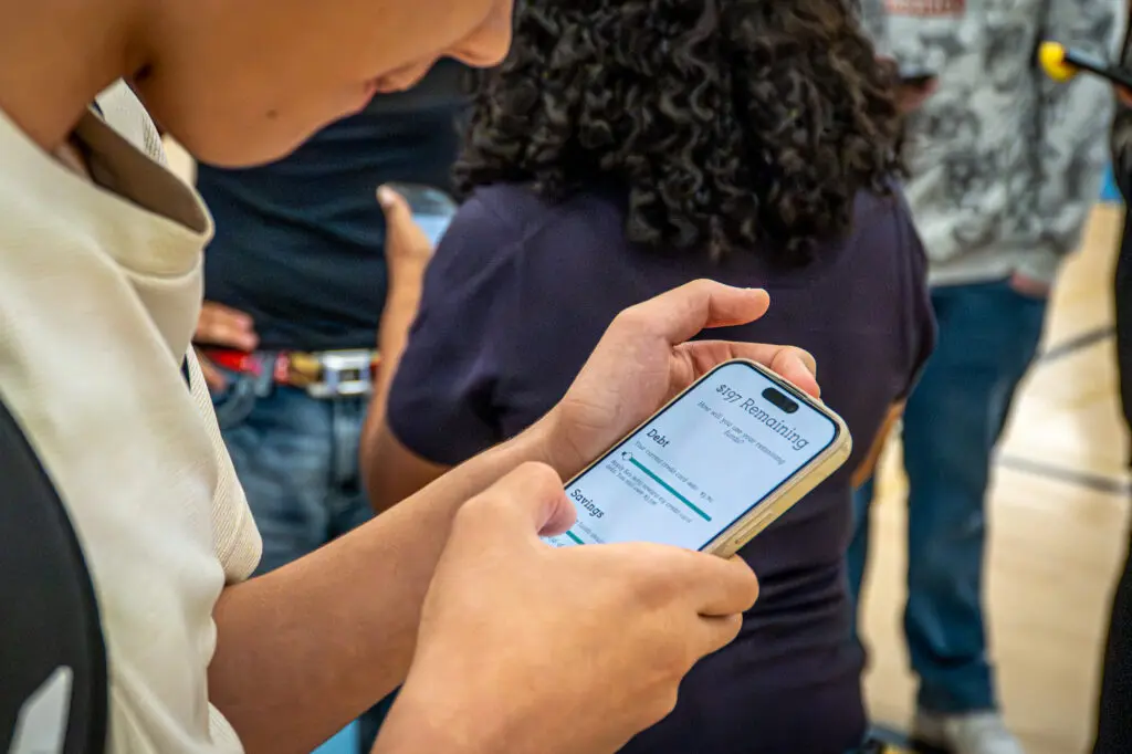 Student looking at phone