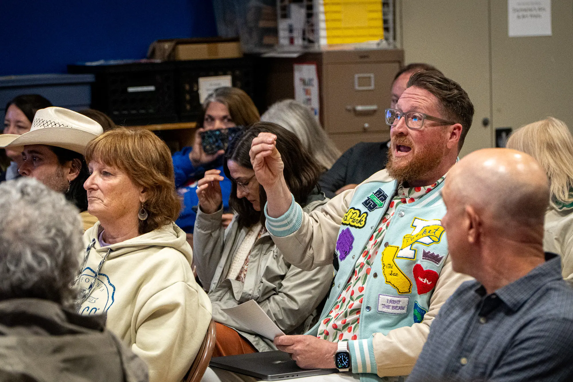 Man speaking at a meeting