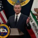 Gov. Gavin Newsom at a podium