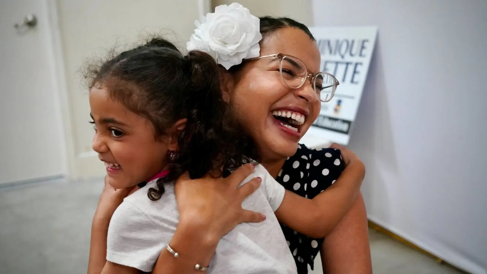 Woman hugs child