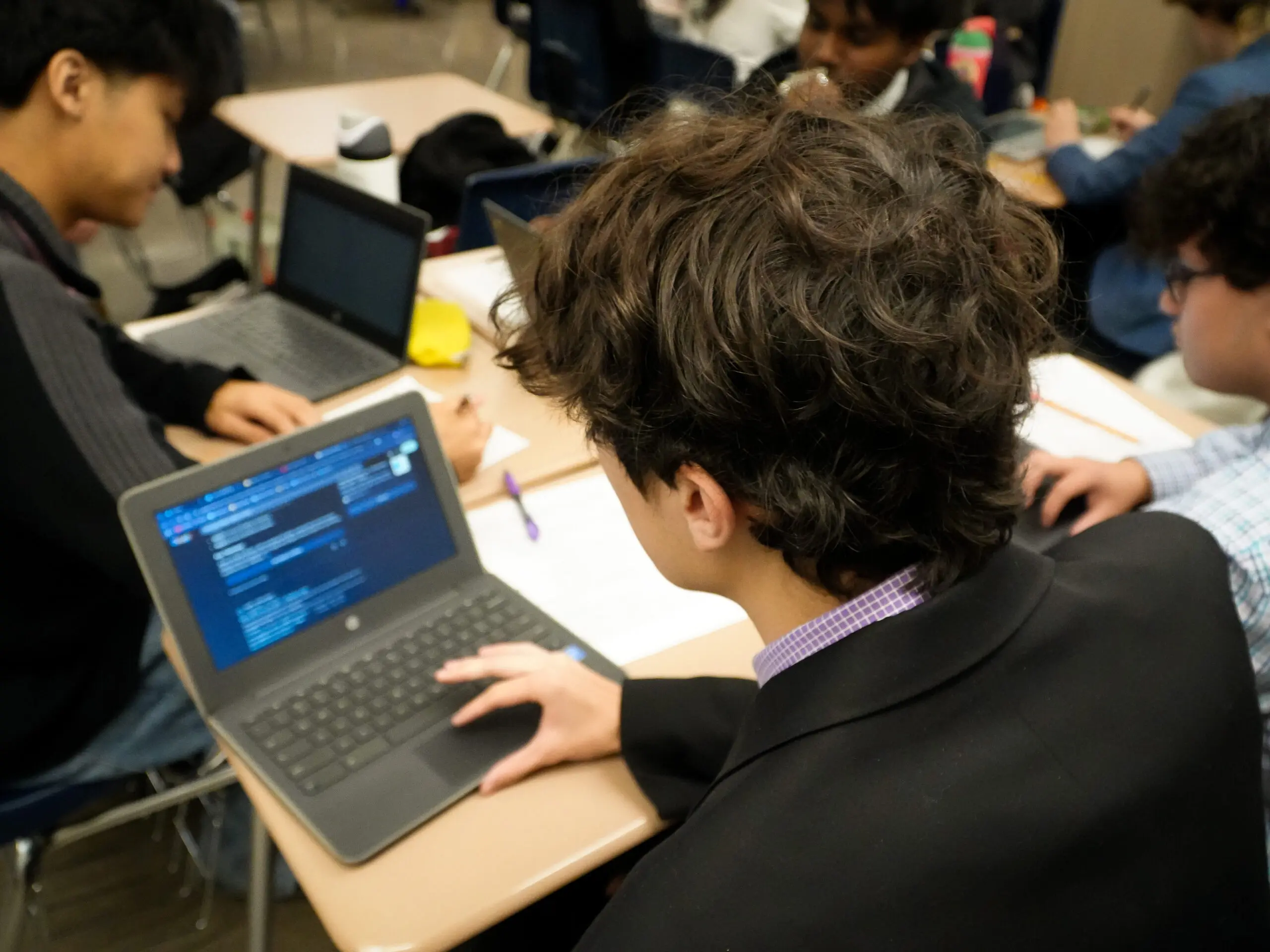 Student looks at computer