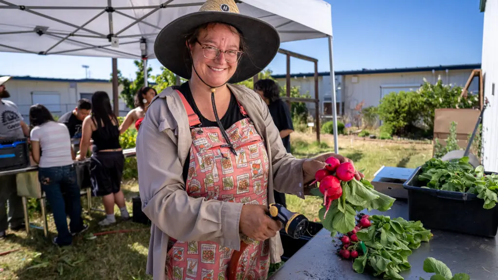 Woman holding crops