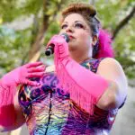 Performer speaks into microphone