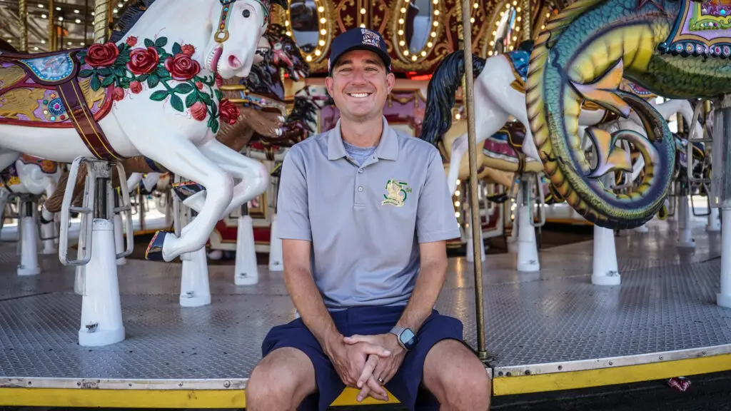 Man sitting on carousel