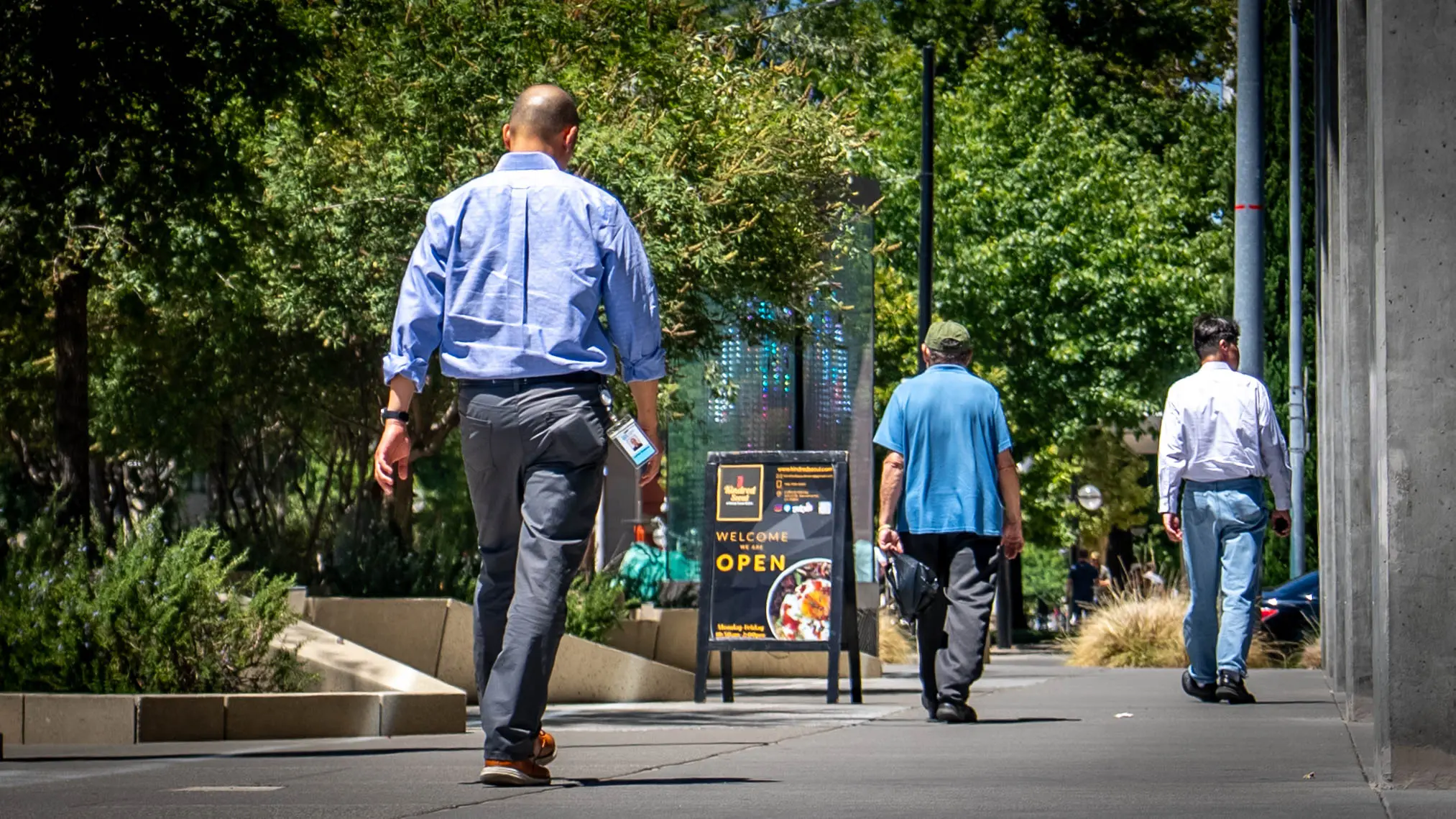 Office workers walk downtown