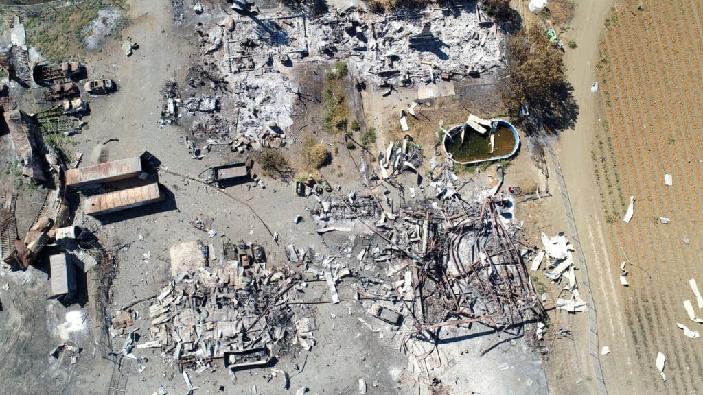 The remains on Sept. 23 of the fireworks storage facility explosion that occurred on July 1, 2025, in Esparto, California. Photo by Denis Akbari.