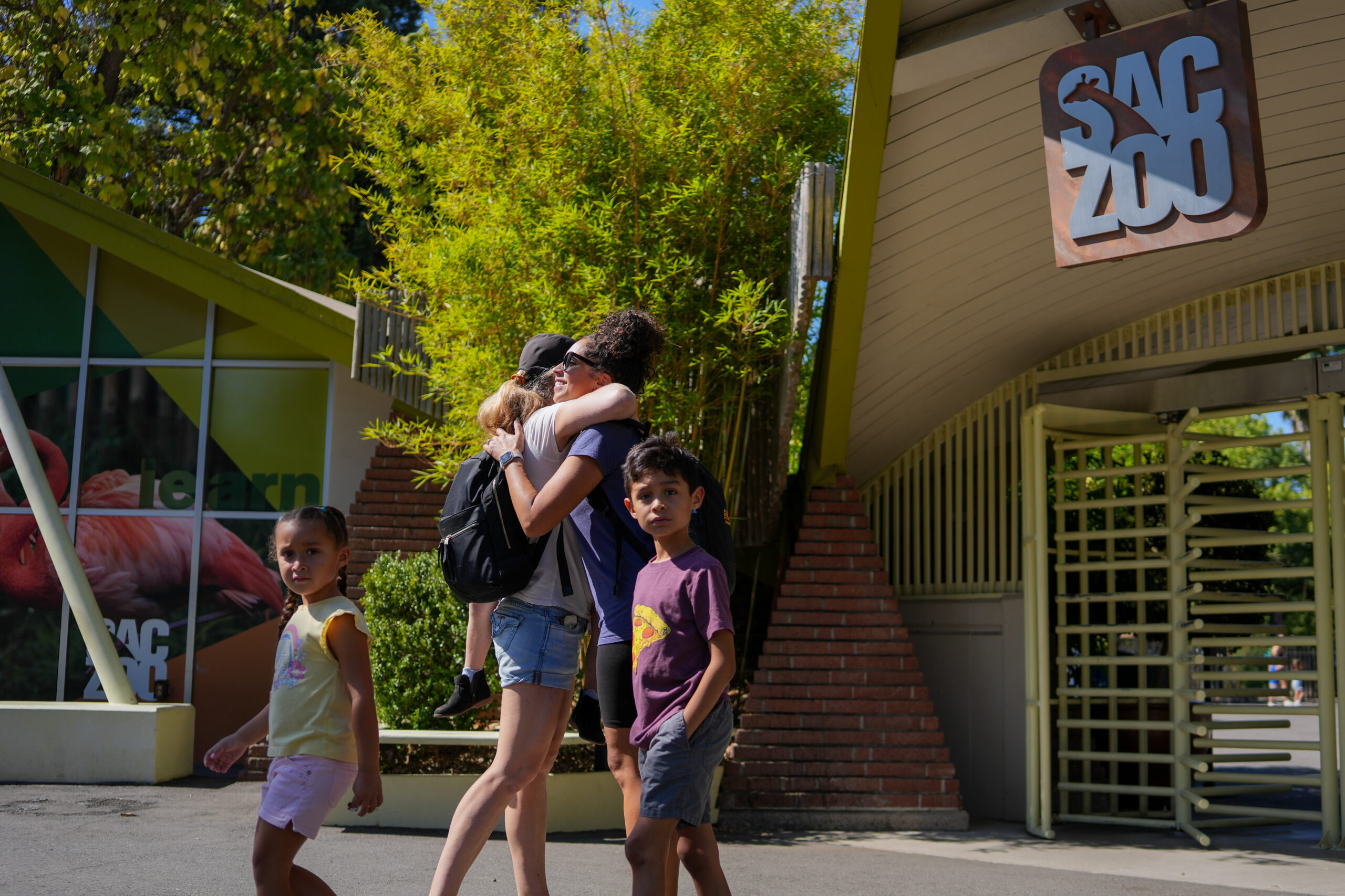 People in front of the Sacramento Zoo entrance. Photo by Denis Akbari.
