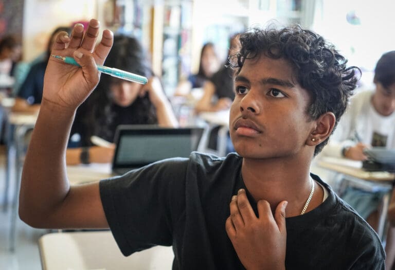 Harish Parameswaran, a student at Mira Loma High School in Sacramento, asks a question about AI.