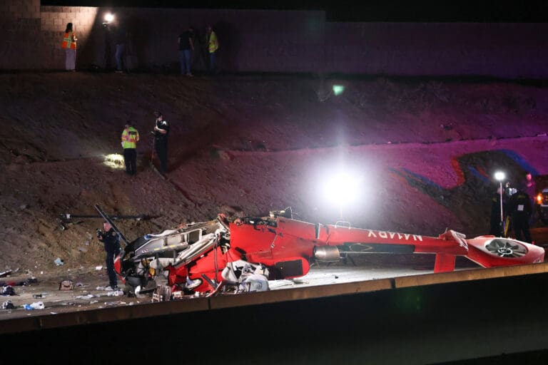 A medical helicopter is shown after it crashed on Highway 50 Monday, Oct. 6, 2025, in Sacramento.
