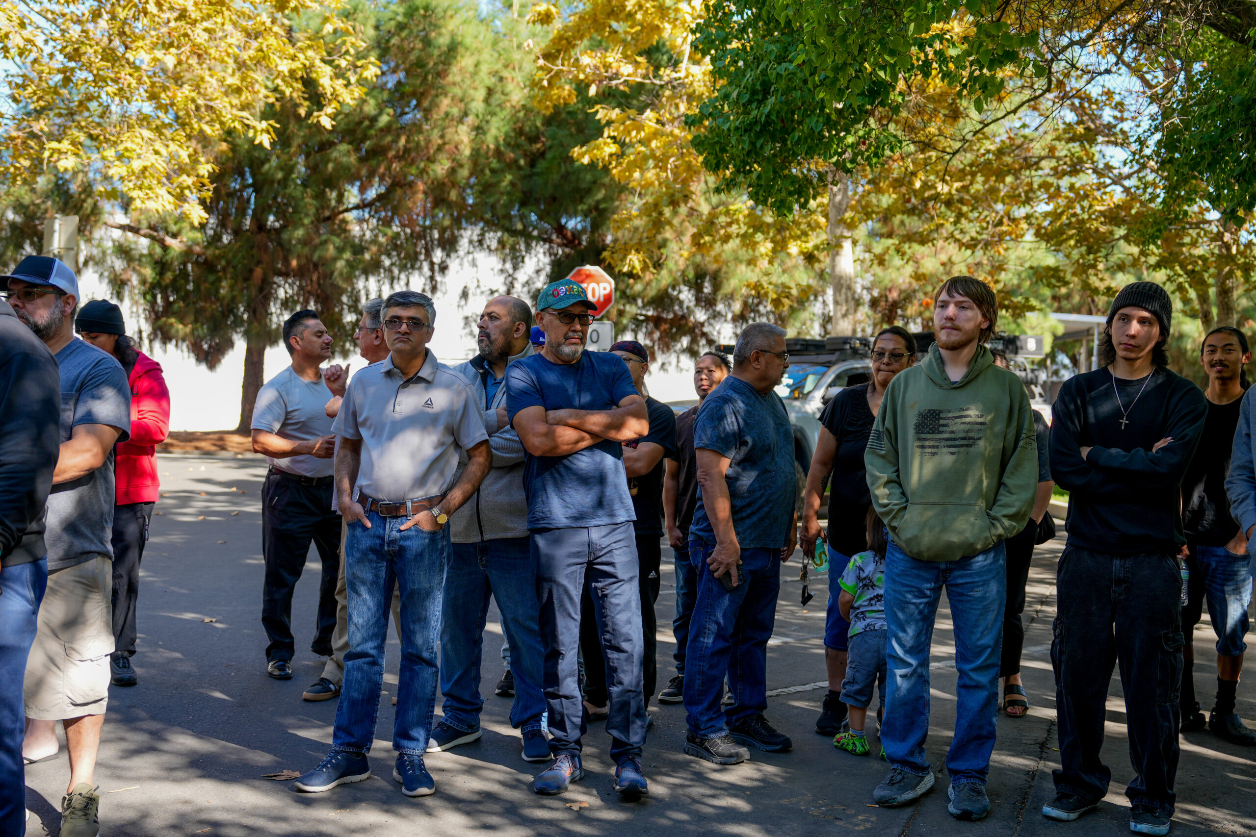 Former employees in front of the Manna Beverages building at 2286 Stone Boulevard in West Sacramento on Oct. 8.
