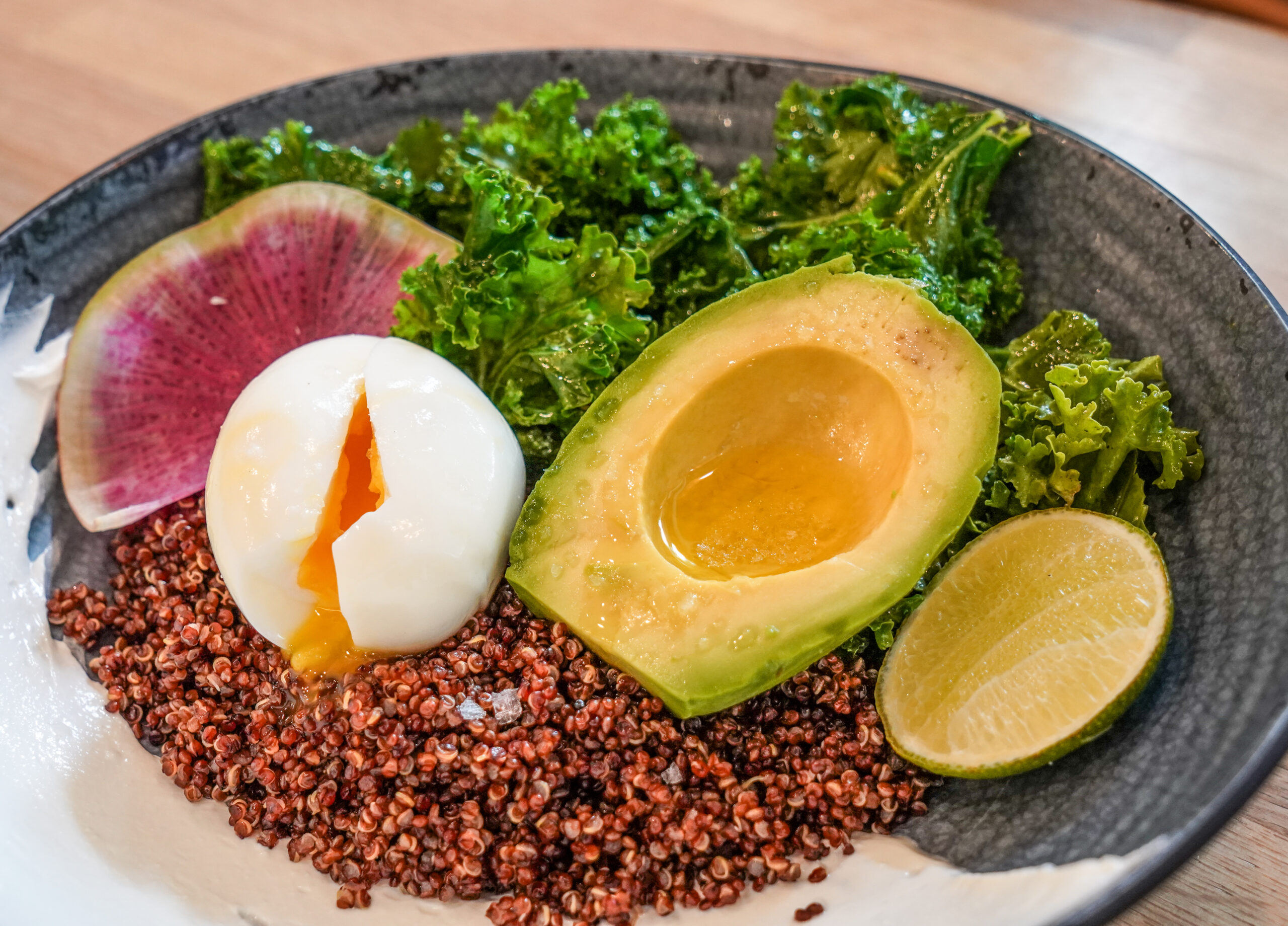 The cove brekkie bowl with quinoa, kale and avocado.