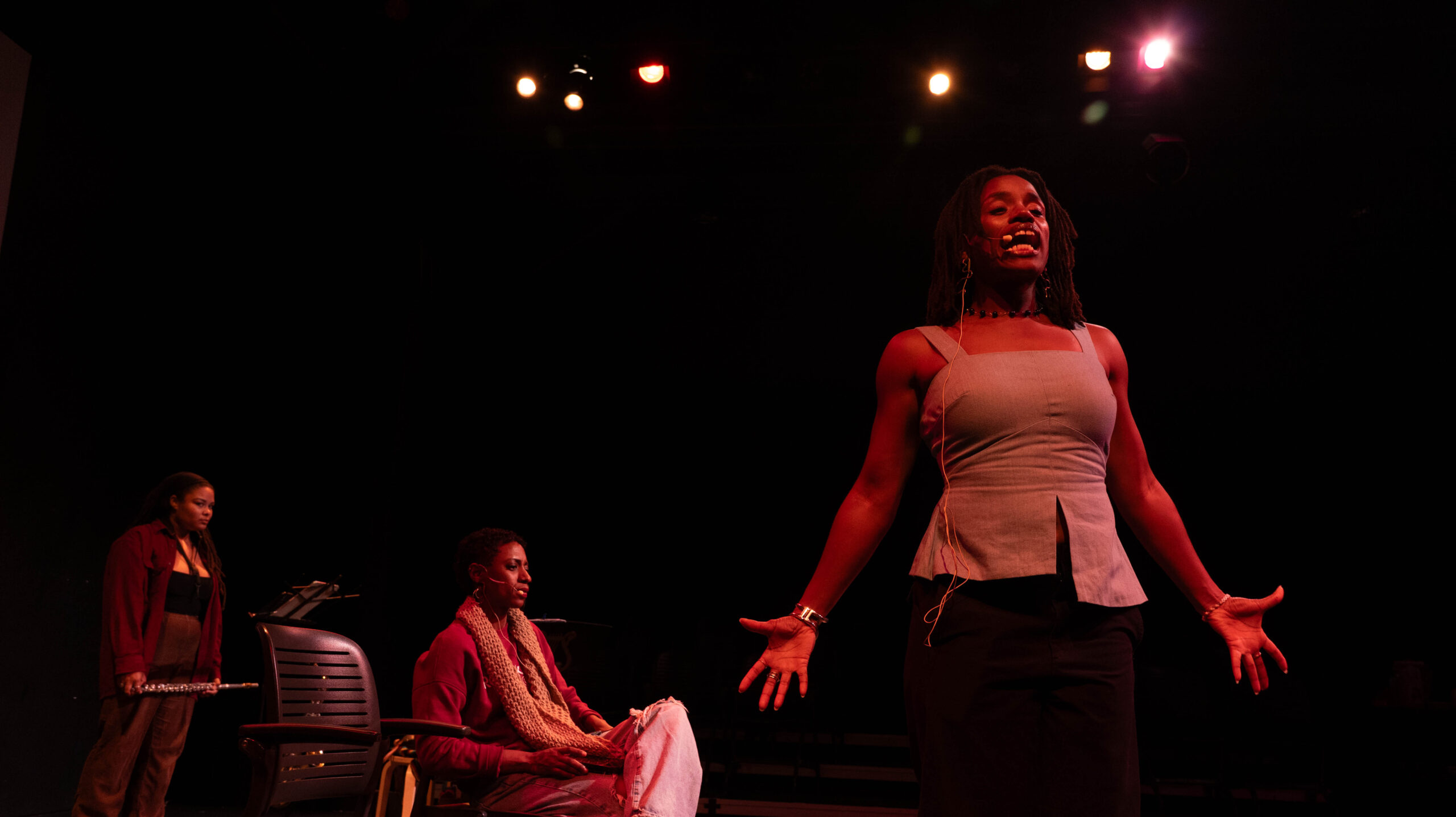 three women at rehearsal