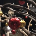 Branch with Christmas decorations