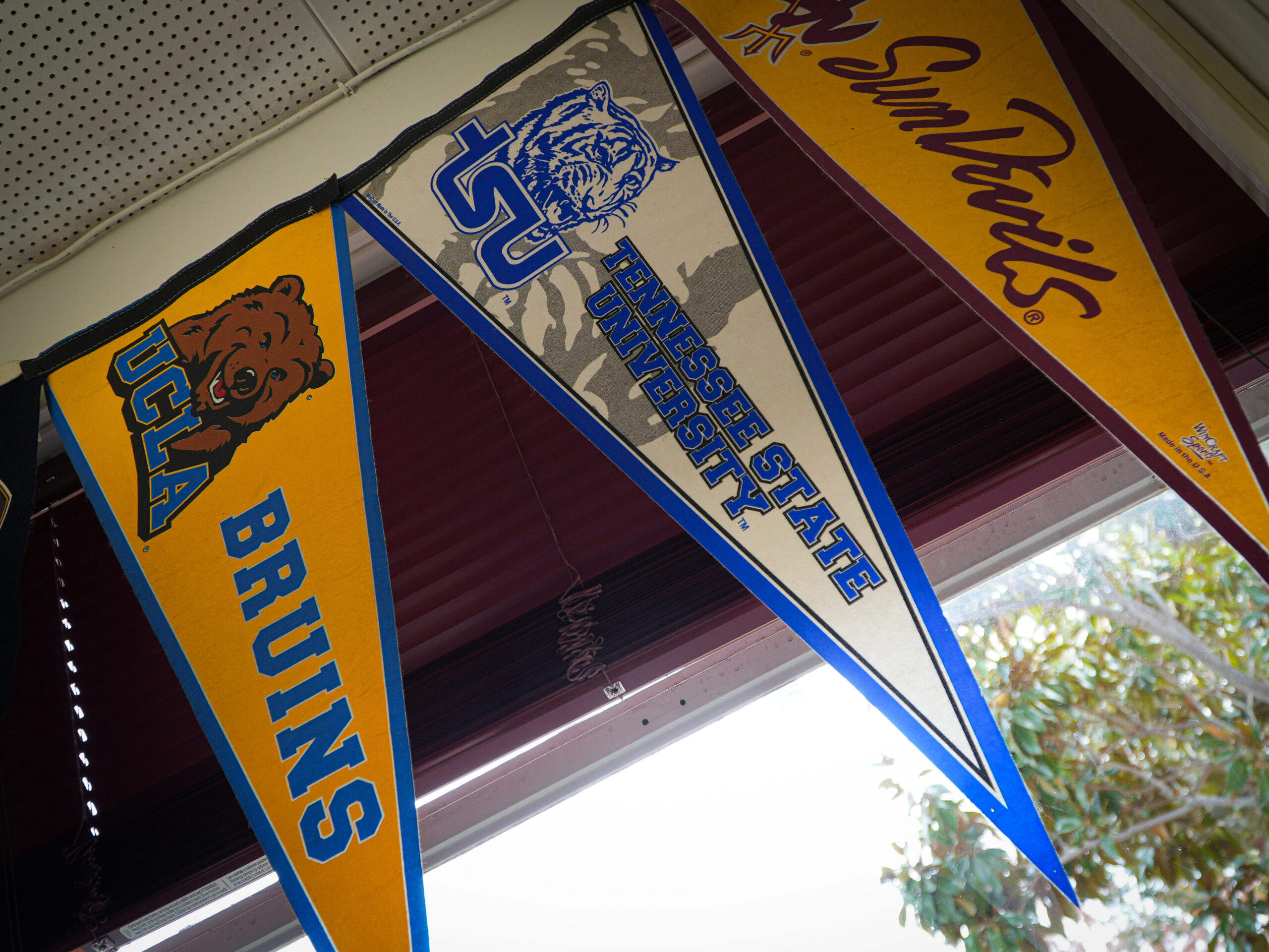 College flags at West Campus High School in Sacramento.