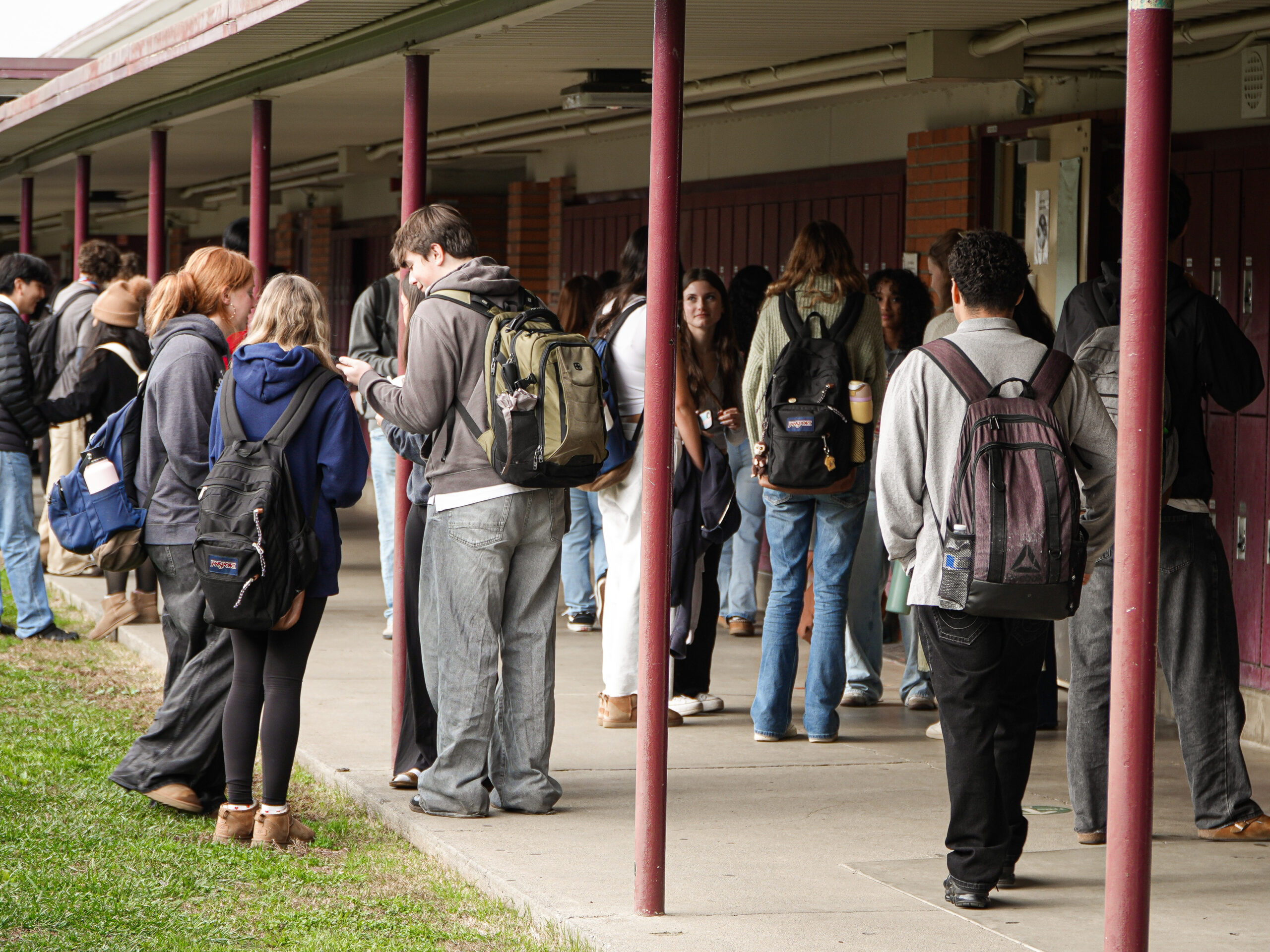 Students standing outside classroom