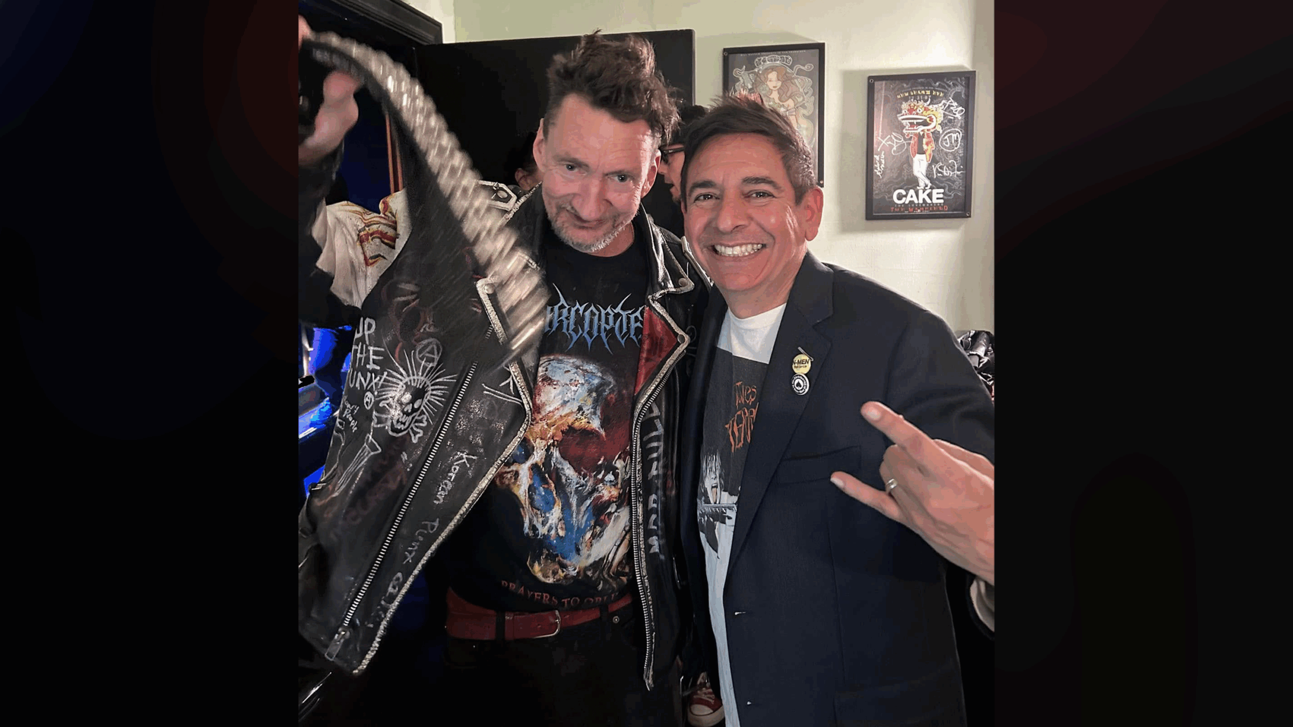 Two men in rock clothes