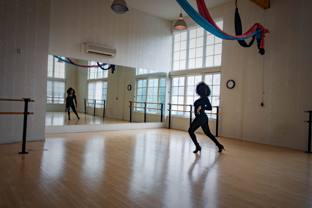 woman dances in studio