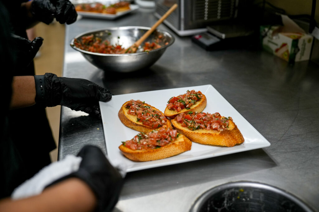 San Juan High School students in a culinary class making bruschettas on Jan. 20. Photo by Denis Akbari.