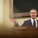 California Gov. Gavin Newsom stands at a podium and delivers the State of the State address on Jan. 8, 2026.