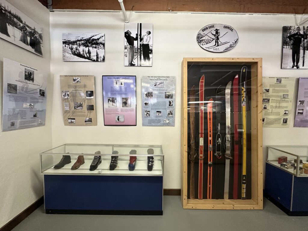 A display at SNOW Sports Museum shows boots and skis