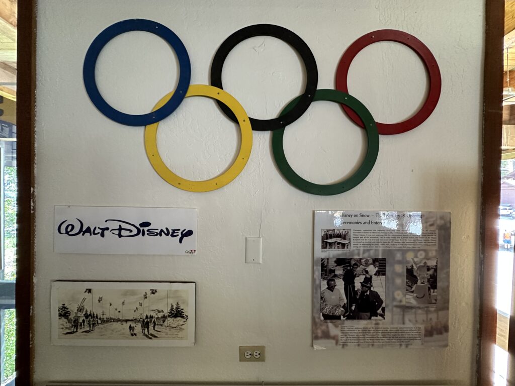 Olympic rings and Walt Disney signature