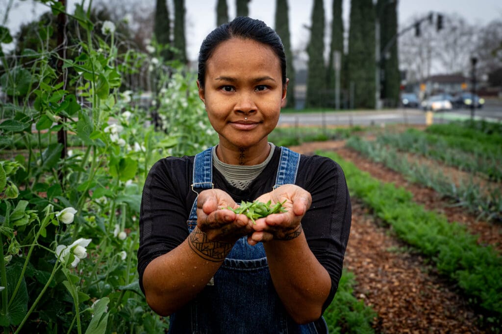 Woman holding crop