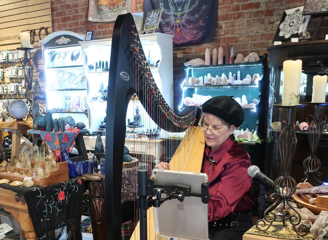 Woman plays harp
