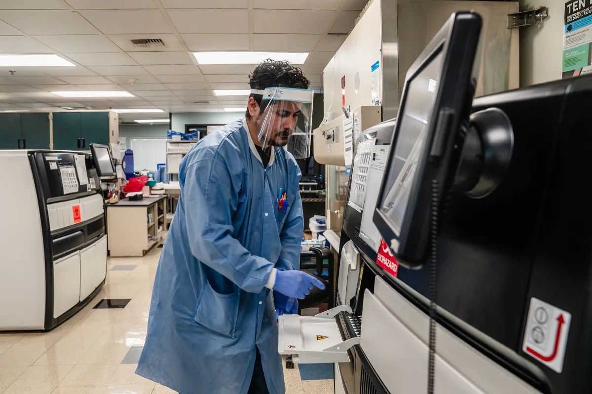 Lab Assistant Abraham Jimenez loads blood samples for automated serology testing for measles immunity status at the Los Angeles County Department of Public Health laboratory in Downey on Feb. 26, 2026.
