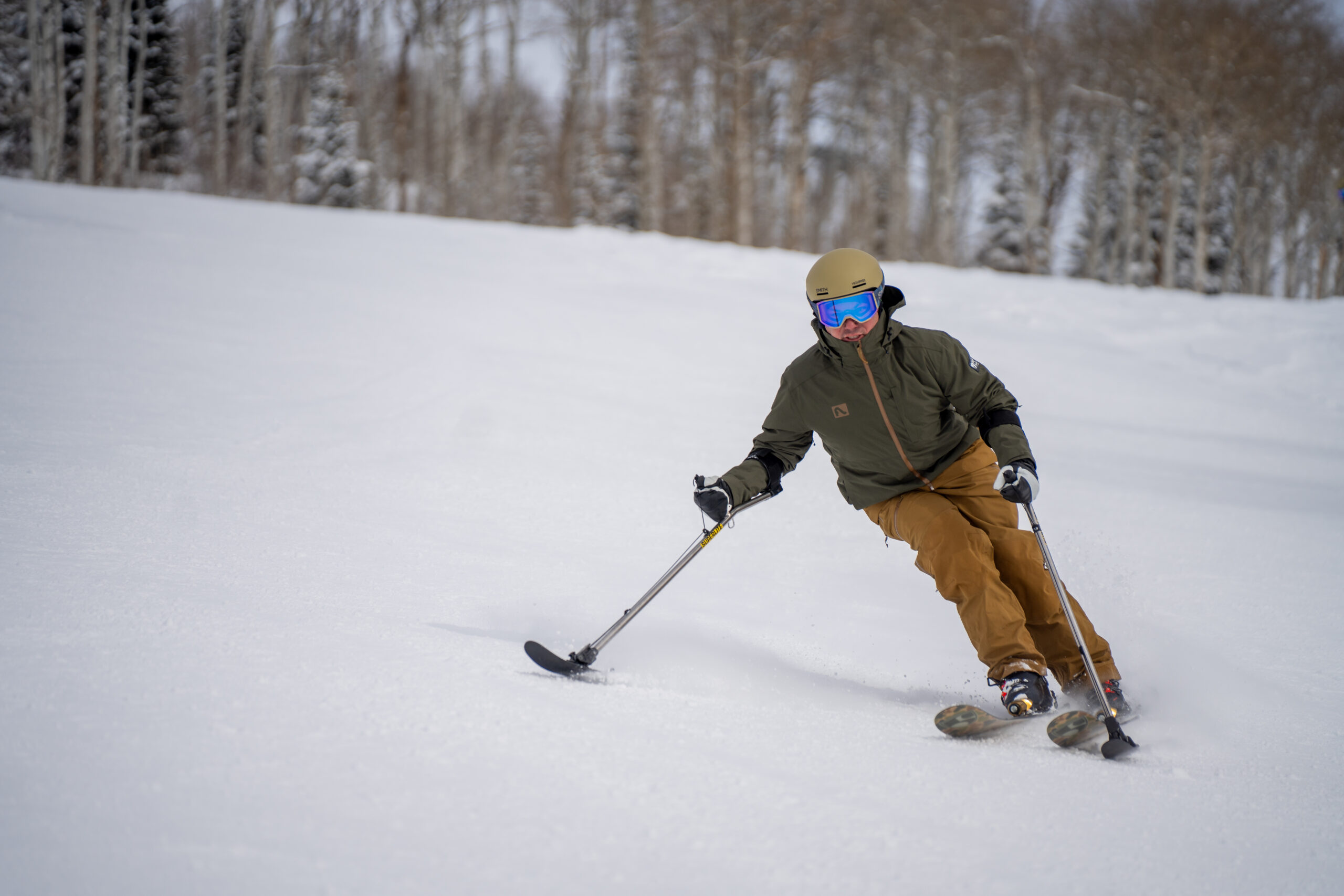 Roy Tuscany uses adaptive ski equipment.