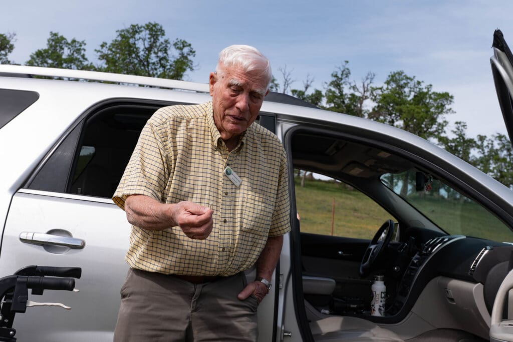 person outside of car