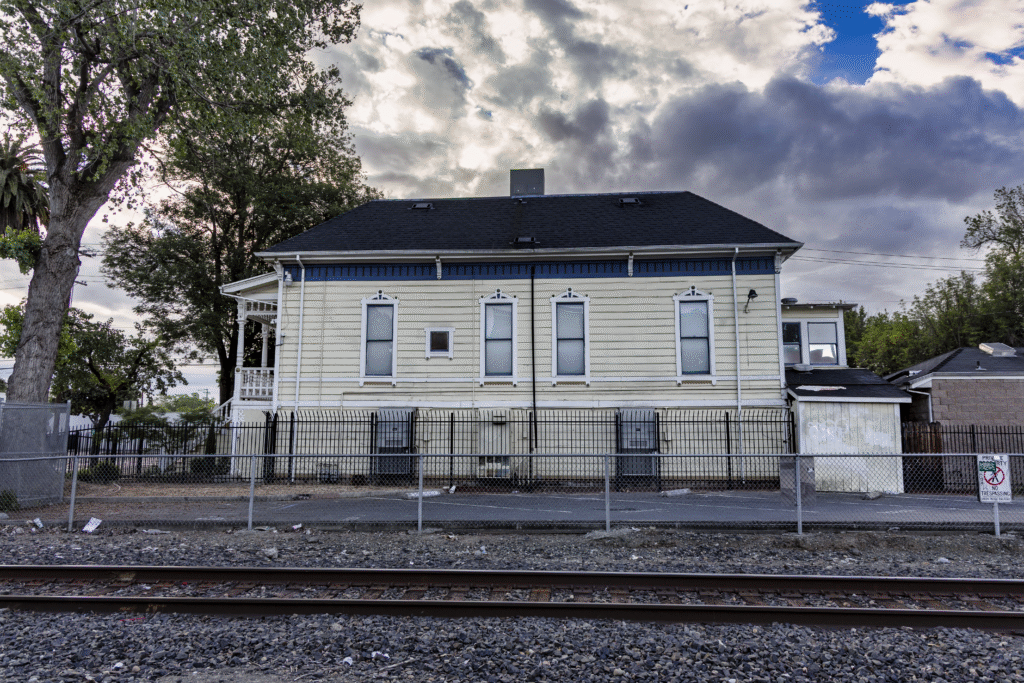 A building next to train tracks