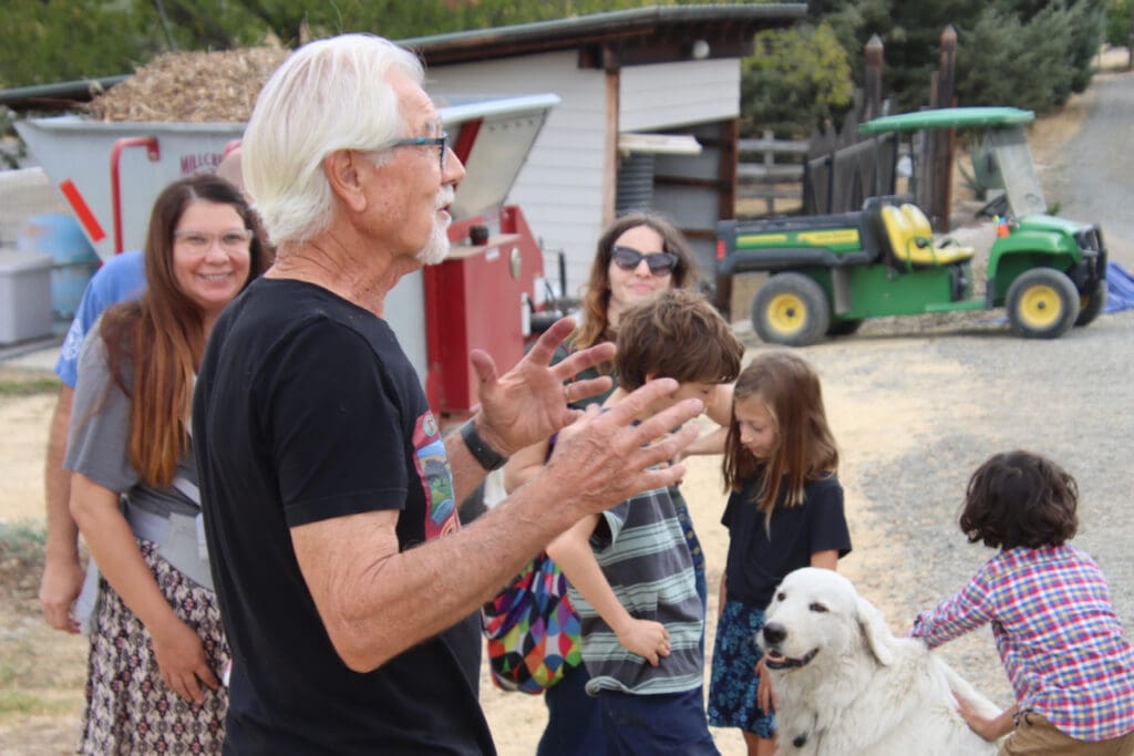 A man gives a farm tour
