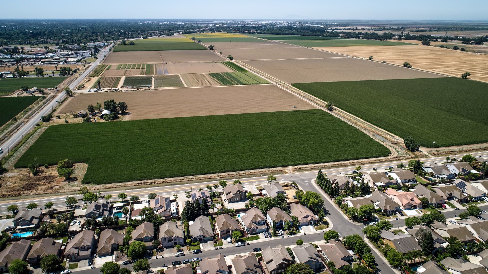 Farm fields and housing