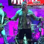 A band plays at a bar