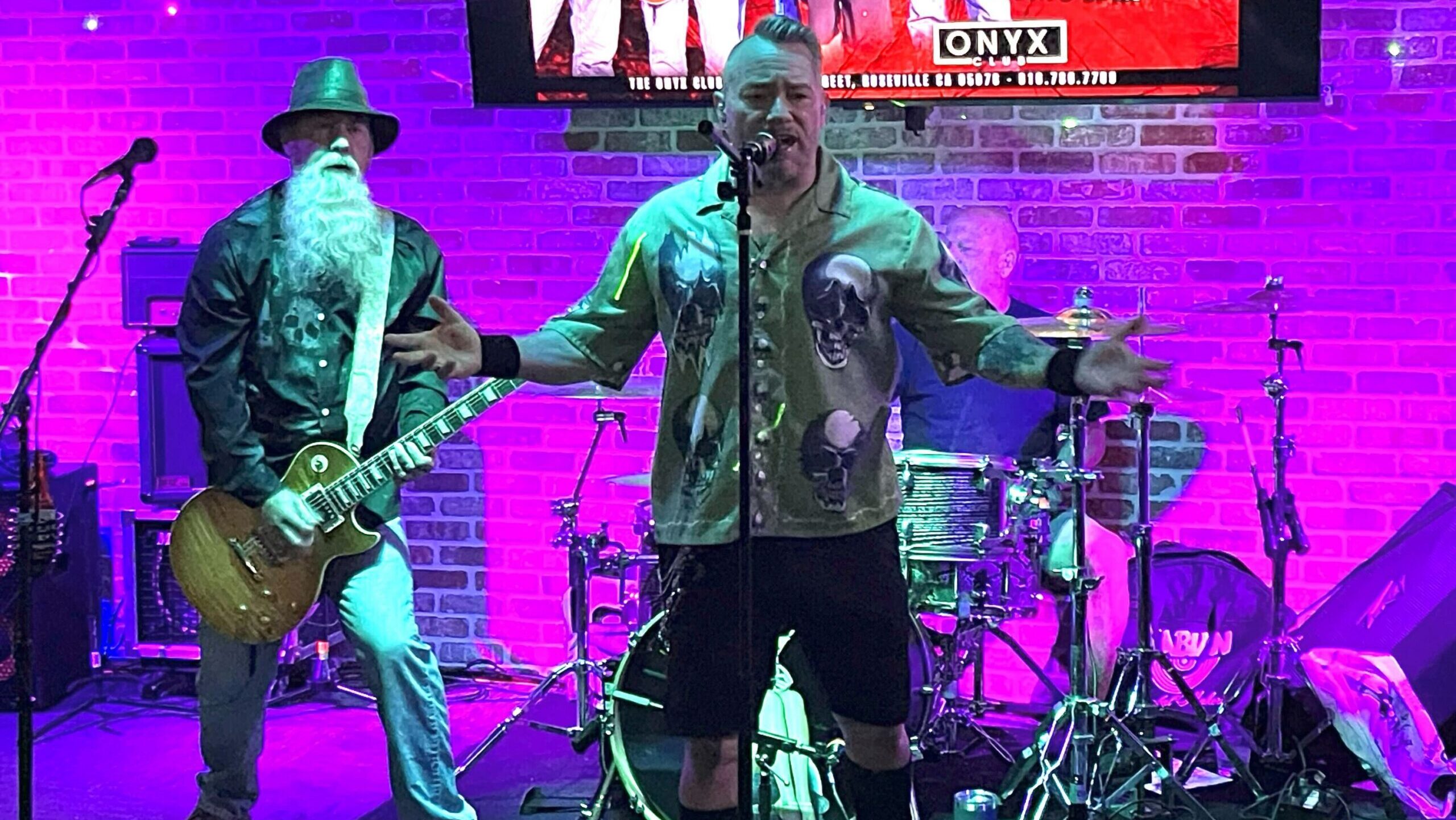 A band plays at a bar