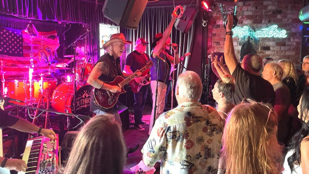 A band plays at a bar
