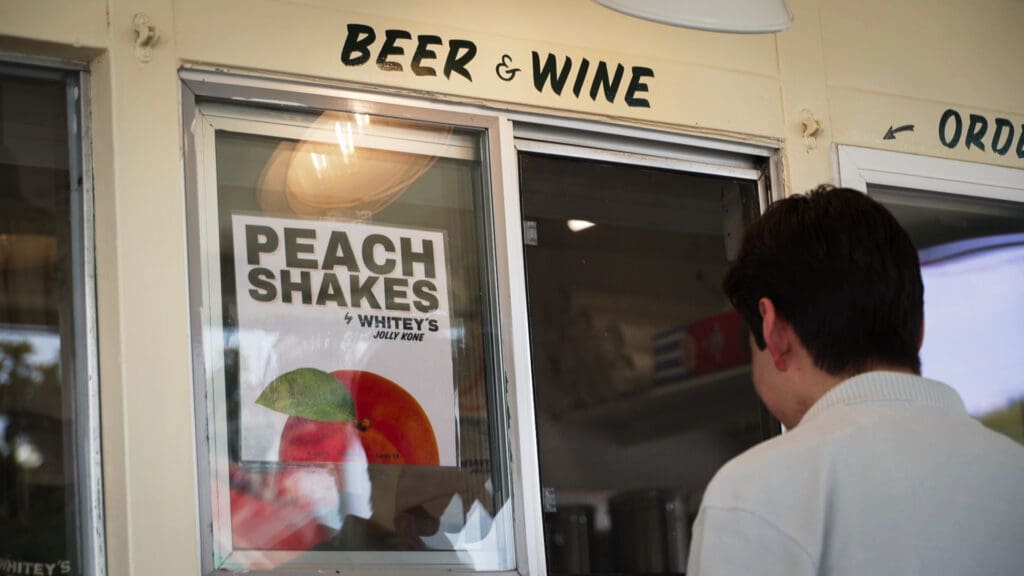 Man orders a peach shake