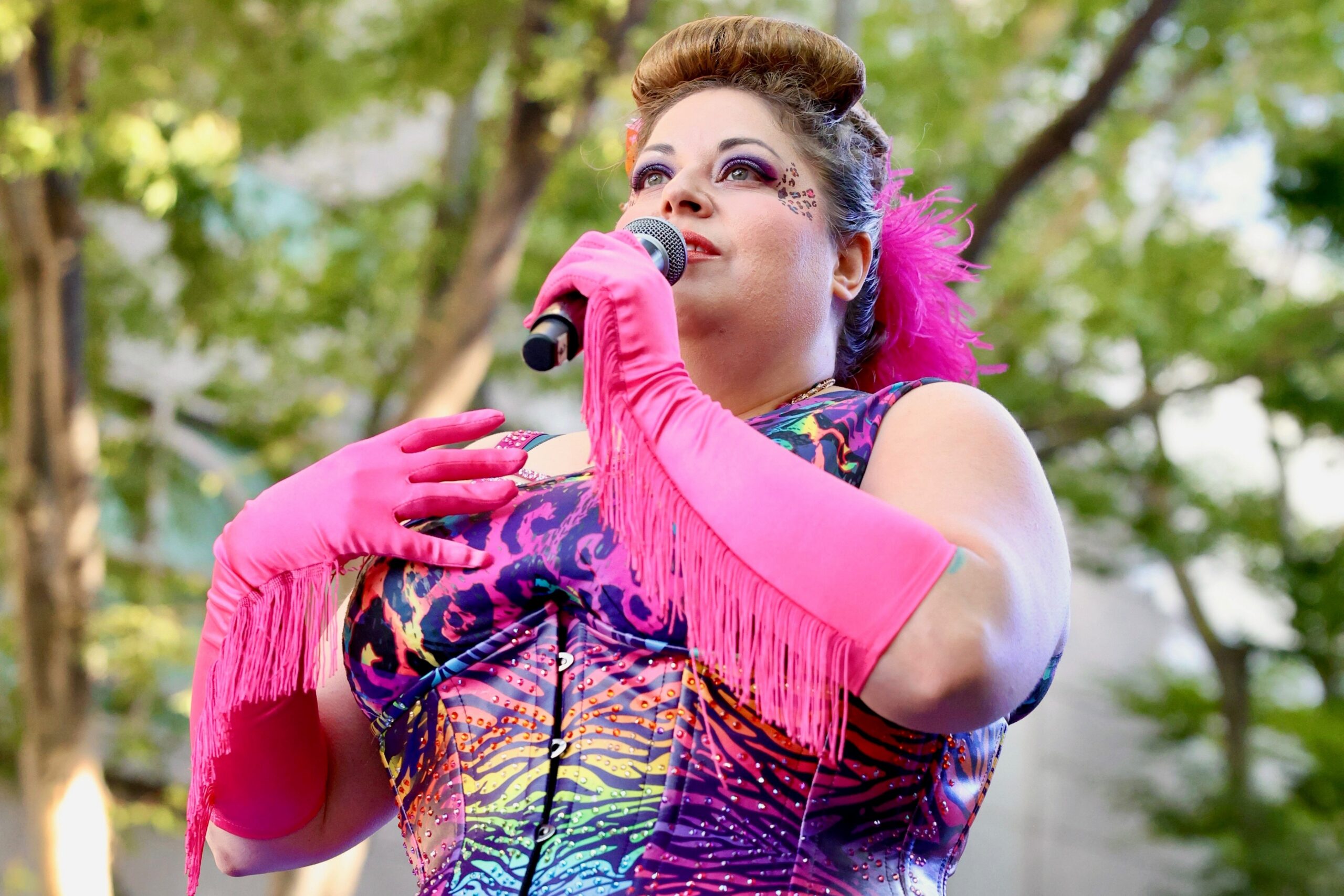 Performer speaks into microphone