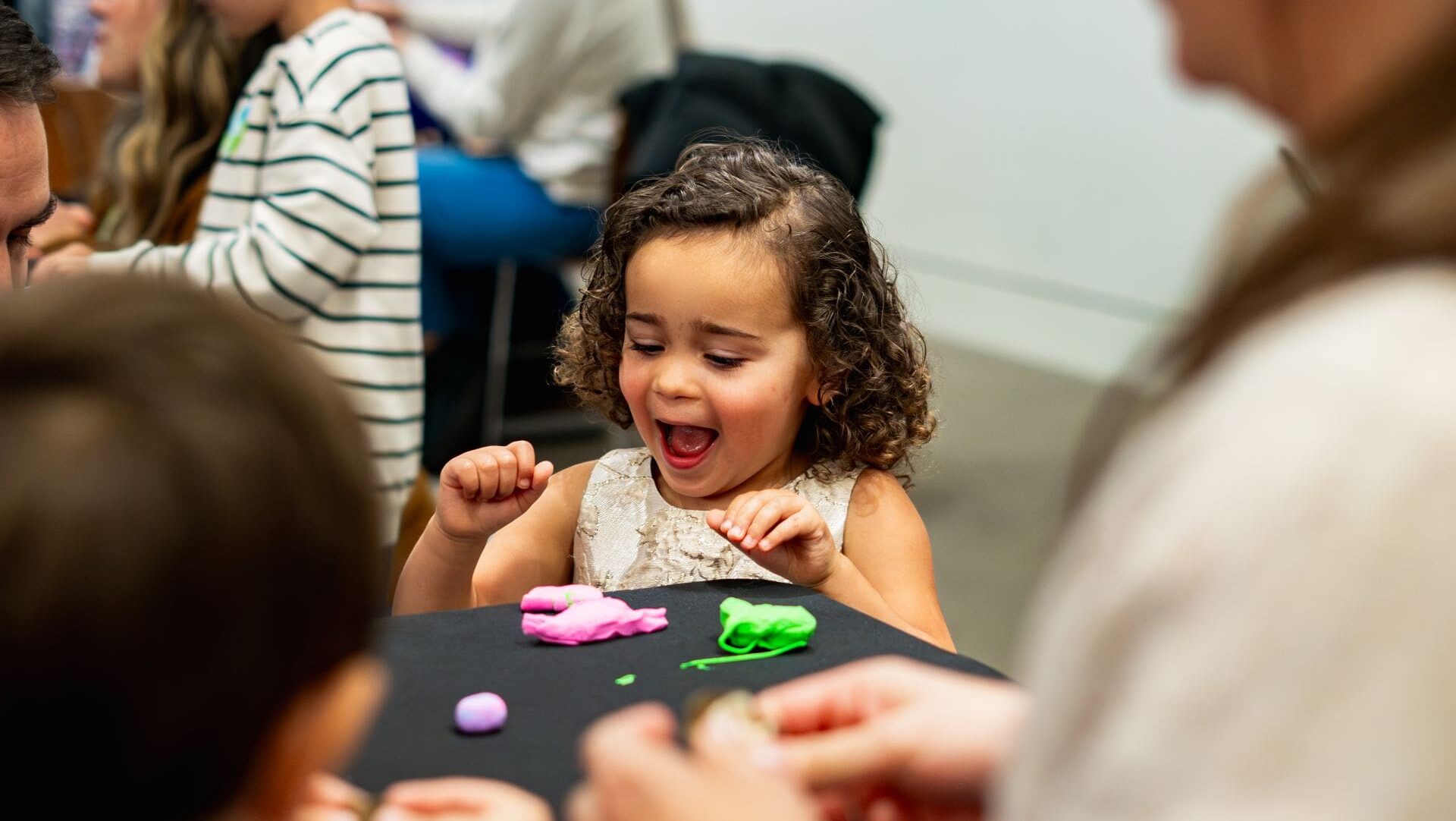 Girl plays with play dough